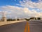 Bridge road with yellow dividing line on a beautiful summer day