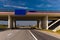 Bridge, roadside and asphalt, blue sky in the city streets in public places.