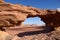 Through a bridge in the rock, Wadi Rum