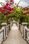 Bridge with rose terrace to Gili Bale in Ujung Water Palace Ujung Park or Sukasada Park on Bali, Indonesia