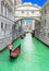 Bridge of Sighs Ponte dei Sospiri and row of gondolas with gondoliers and Rio de Palazzo o de Canonica Canal from Riva degli