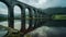 A bridge spans a river with a reflection of the bridge in the water