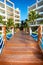 Bridge and swimming pool at caribbean resort.