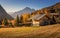 Bridge to the colors of autumn. Passo Falzarego