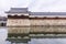 The bridge to entrance at hiroshima castle with wall to protect