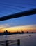 Bridge to the island of RÃ¼gen with sunset and sailboat. Germany