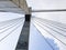 Bridge tower concrete columns with cable stays; Urban city transportation architecture structure, viewed from below.