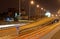 The bridge of a traffic interchange at night