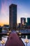 Bridge and the World Trade Center at sunset at the Inner Harbor, in Baltimore, Maryland.