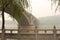 Bridge on the Yi River in a haze, China
