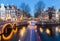 Bridges at the Leidsegracht and Keizersgracht canals intersection in Amsterdam