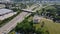 Bridges, roads top aerial view of highway of urban elevated road junction and interchange overpass in city with traffic