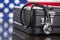 Briefcase and Stethoscope Resting on Table with American Flag Be