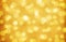 Bright abstract gold bokeh sparkle background. Christmas and New Year backdrop