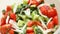 bright appetizing fresh vegetable salad close-up