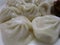 Bright attractive delicious steamed Chinese dim sum home-made pork buns 2019