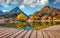 Bright autumn day on the shore of the Jasna lake. Stunning summer scene of Julian Alps, Gozd Martuljek location, Slovenia, Europe.