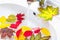 Bright autumn leaves floating in trendy white sink