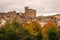 Bright autumn view with yellow and orange trees to medieval town of Nazzano, Lazio in Italy