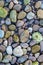 Bright background of color pebbles on the beach