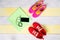 Bright background for jogging, with two pairs of shoes and a music phone