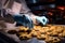 Bright backpacked baker dons gloves for making chocolate chip cookies