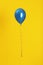 Bright balloon with ribbon