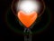 Bright balloon in the shape of a heart, on a black background. Colorful rubber heart in a zipper. Concept: open love, openness