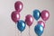 Bright balloons with ribbons flying