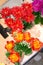 Bright and beautiful colors of plastic flowers. Various color flower background wall. Floral background. Lot of artificial flowers