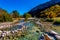 Bright Beautiful Fall Foliage on the Crystal Clear Frio River in Texas.