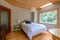 Bright bedroom in a rustic cottage