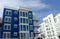 Bright blue condo building in Little Italy neighborhood