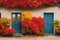 Bright blue front door of house with autumn bushes growing nearby