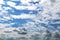 Bright blue retro vintage clear blue clouds white puffy cumulous distant cloudscape environment nature background