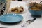 Bright blue stylish accent on the relaxed atmosphere of the table. Unpresentable appearance of photos of everyday dishes