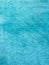 Bright blue textured background, well visible texture, there are several bands, similar to the texture of Terry towels.