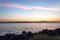 Bright blue water of puget sound along shoreline of washington