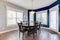 Bright breakfast nook with ceramic floors