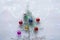 Bright Christmas balls  on stylized Christmas tree. Bright festoon illumination - digital composite. Free space for text