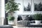 Bright and clean living room with tall plants and gray couch