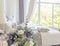 Bright, clean stylish interior bedroom and living room with a large panoramic window. beautiful rich antique furniture. four-