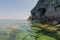 Bright clear aqua green water on Bruce Peninsula with big limestone rocks