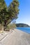 bright clear blue skies over a rocky beach