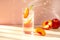 Bright and cocktail image of peach spritzer against the background in the color of apricot crush . Close-up. Generative