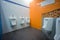 Bright color public toilet on gas station in asia