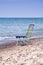 Bright colored chair on the beach