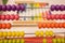 Bright colored hand abacus. Children`s wooden toy for the study of arithmetic.