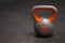 Bright colored plastic kettlebell weight weighing eight kilograms