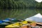 Bright colorful boats moored on quiet mountain lake